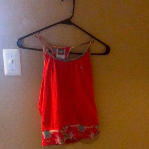 I’m selling a pinkish reddish tank top. Pretty new